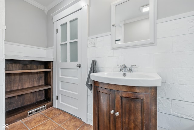 2896 Sutherland Ave, Indianapolis, IN 46205 - bathroom featuring ornamental molding and vanity