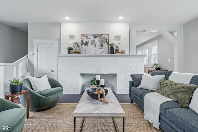 2896 Sutherland Ave, Indianapolis, IN 46205 - living room featuring a fireplace, stairway, and recessed lighting