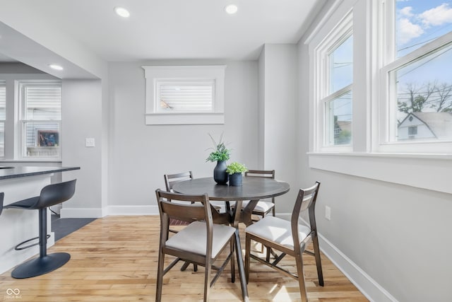 2896 Sutherland Ave, Indianapolis, IN 46205 - dining area featuring light wood-style floors, baseboards, and recessed lighting
