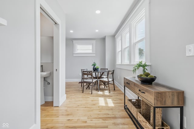 2896 Sutherland Ave, Indianapolis, IN 46205 - dining area featuring light wood-type flooring, baseboards, and recessed lighting