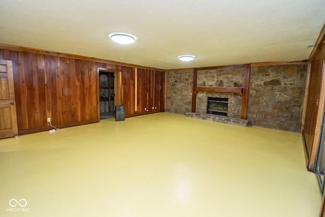 5530 Shawnee Trail S Drive, Indianapolis, IN 46220 - below grade area with a stone fireplace and wood walls