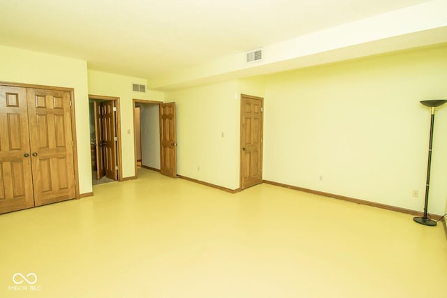 5530 Shawnee Trail S Drive, Indianapolis, IN 46220 - unfurnished bedroom with a closet and concrete floors