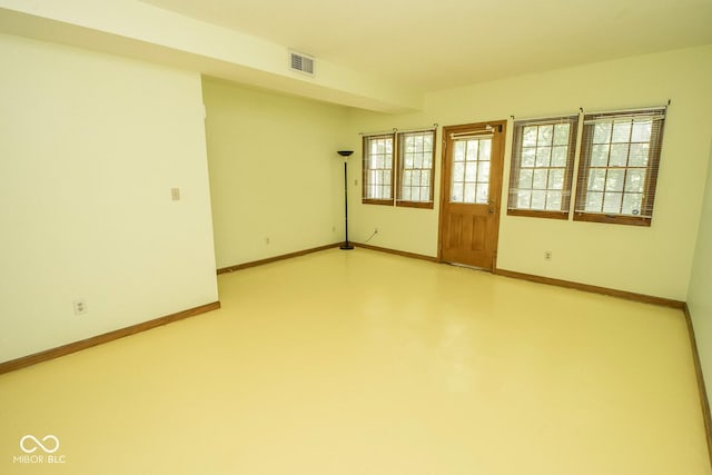 5530 Shawnee Trail S Drive, Indianapolis, IN 46220 - unfurnished room featuring baseboards and concrete floors
