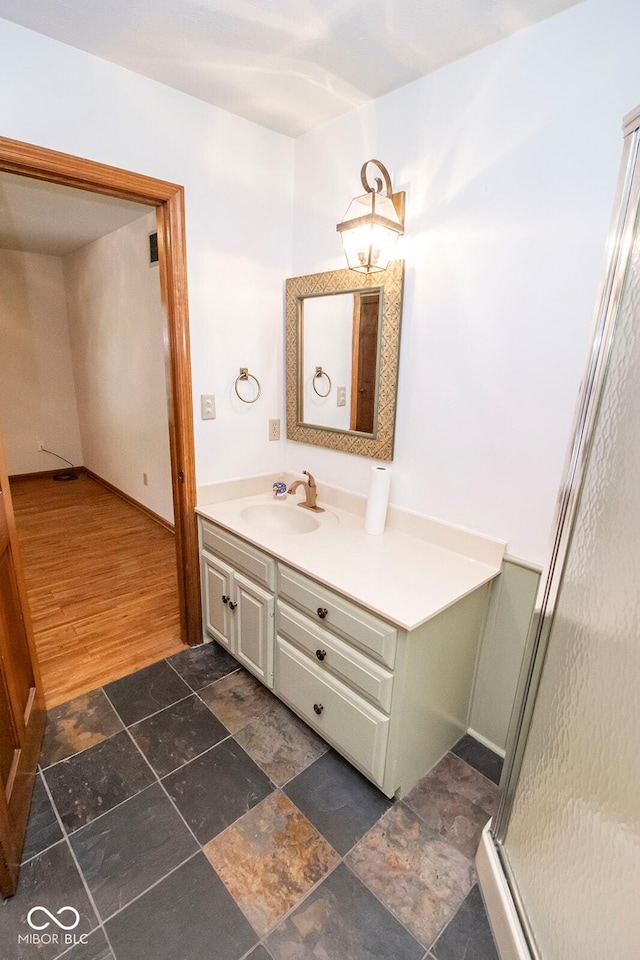 5530 Shawnee Trail S Drive, Indianapolis, IN 46220 - full bath featuring vanity, stone finish flooring, and a stall shower