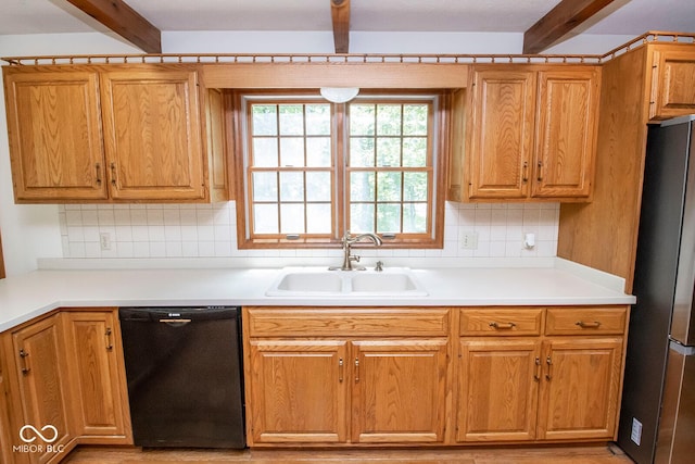 5530 Shawnee Trail S Drive, Indianapolis, IN 46220 - kitchen featuring dishwasher, freestanding refrigerator, beamed ceiling, tasteful backsplash, and light countertops