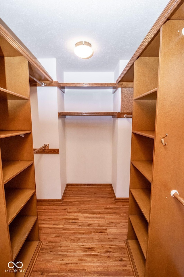 5530 Shawnee Trail S Drive, Indianapolis, IN 46220 - spacious closet with wood finished floors