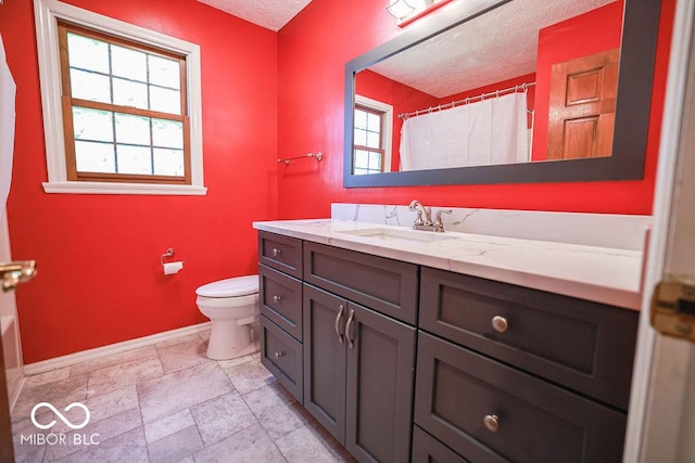 5109 N Weathers Ct, Bloomington, IN 47404 - bathroom with a textured ceiling, vanity, and a shower with curtain