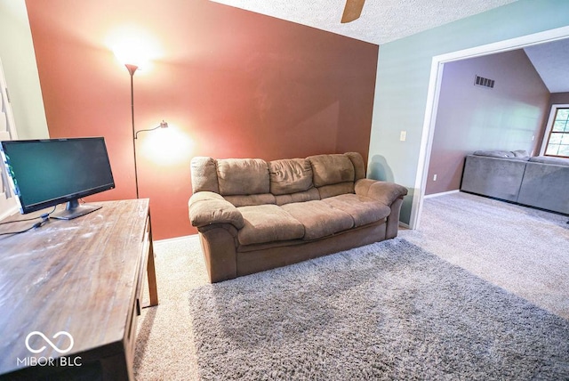 5109 N Weathers Ct, Bloomington, IN 47404 - carpeted living room with a ceiling fan and a textured ceiling
