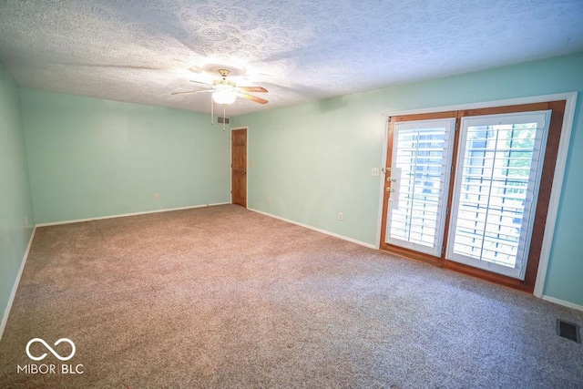 5109 N Weathers Ct, Bloomington, IN 47404 - unfurnished room featuring carpet floors, a ceiling fan, and a textured ceiling