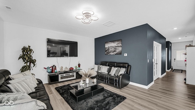 8690 Lester Pl, Pendleton, IN 46064 - living area featuring light wood-style floors and recessed lighting