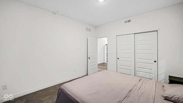 8690 Lester Pl, Pendleton, IN 46064 - bedroom featuring a closet and dark carpet