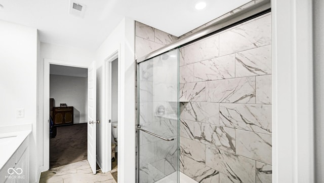 8690 Lester Pl, Pendleton, IN 46064 - bathroom with marble finish floors, a stall shower, and vanity