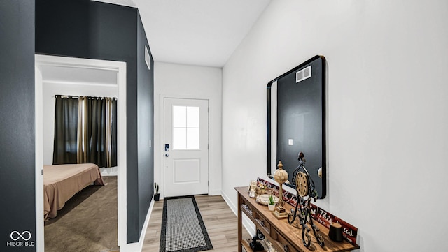 8690 Lester Pl, Pendleton, IN 46064 - foyer with light wood-type flooring and baseboards