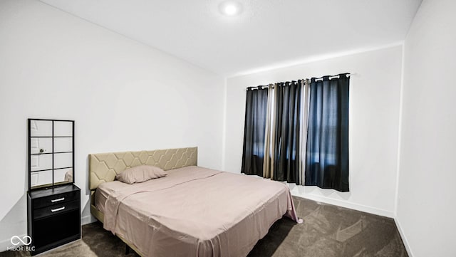 8690 Lester Pl, Pendleton, IN 46064 - bedroom featuring dark carpet and baseboards