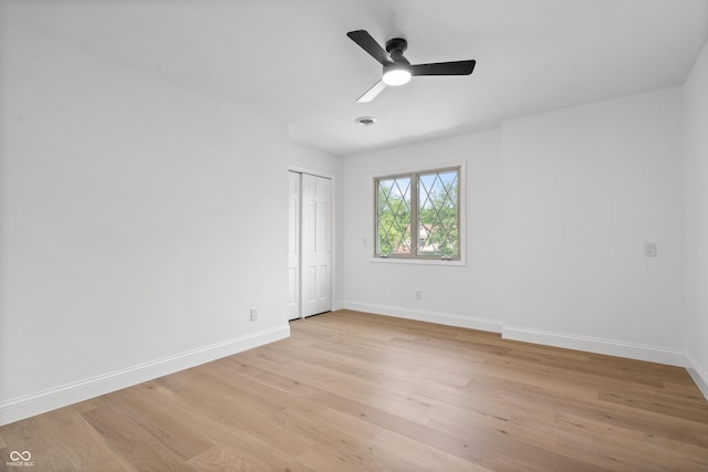 9205 Selkirk Ct, Indianapolis, IN 46260 - unfurnished room with light wood-style floors and ceiling fan