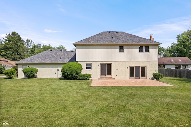9205 Selkirk Ct, Indianapolis, IN 46260 - back of house with a patio, a chimney, brick siding, and entry steps