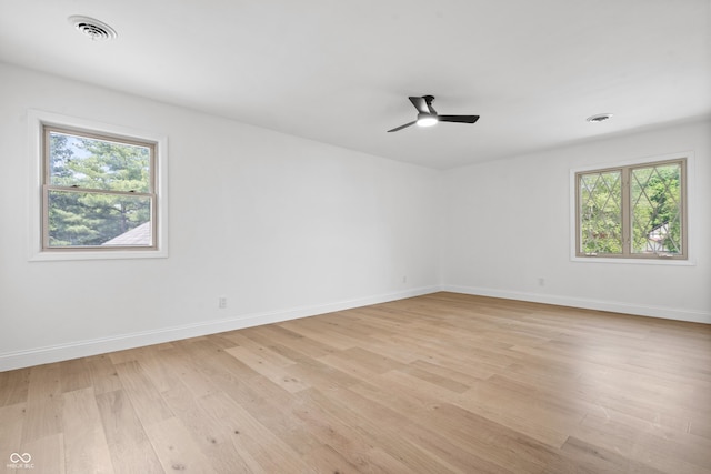9205 Selkirk Ct, Indianapolis, IN 46260 - spare room with light wood finished floors and a ceiling fan