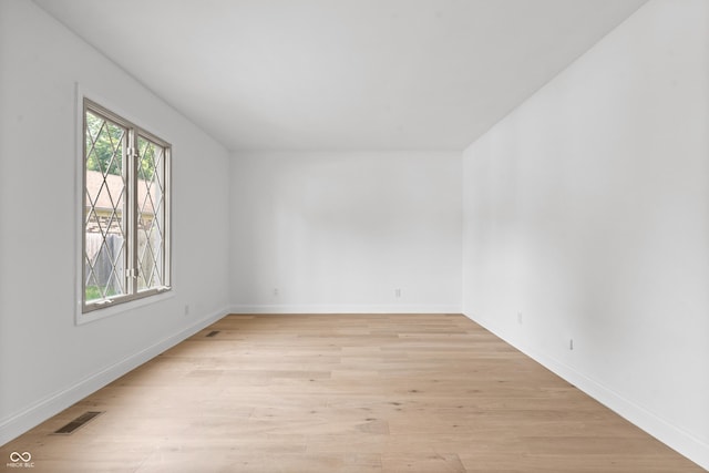 9205 Selkirk Ct, Indianapolis, IN 46260 - spare room featuring light wood-type flooring and baseboards