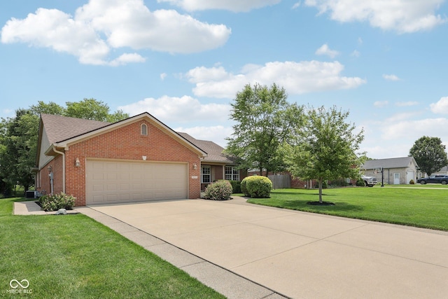 3571 S Cedar Creek Ln, New Palestine, IN 46163 - view of front of house featuring brick siding, a garage, a front yard, and concrete driveway