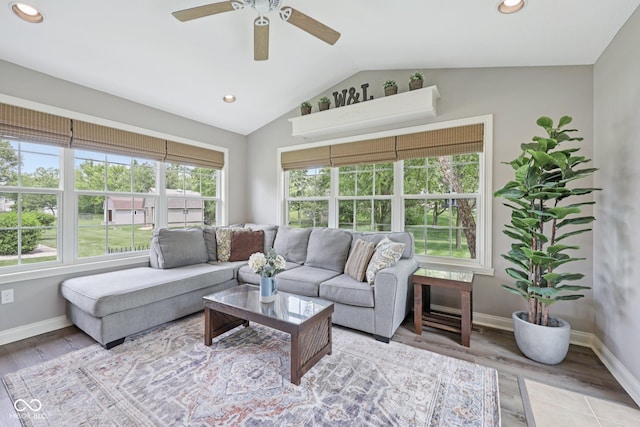 3571 S Cedar Creek Ln, New Palestine, IN 46163 - living area with vaulted ceiling, healthy amount of natural light, a ceiling fan, recessed lighting, and wood finished floors