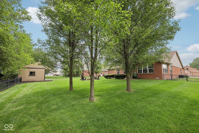 3571 S Cedar Creek Ln, New Palestine, IN 46163 - view of yard with a storage unit