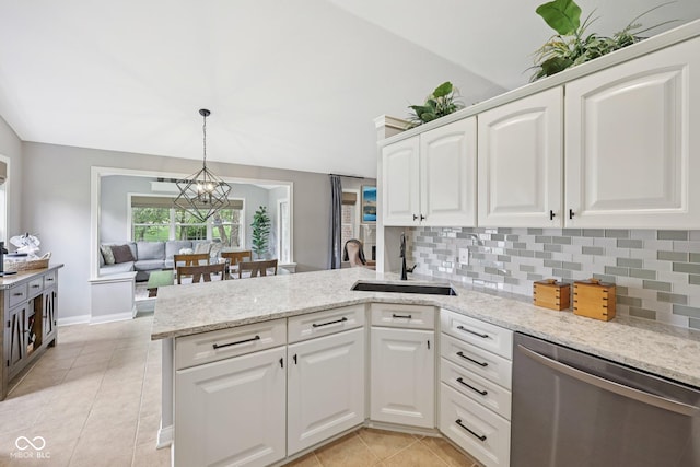 3571 S Cedar Creek Ln, New Palestine, IN 46163 - kitchen with dishwasher, a peninsula, light tile patterned floors, and decorative backsplash