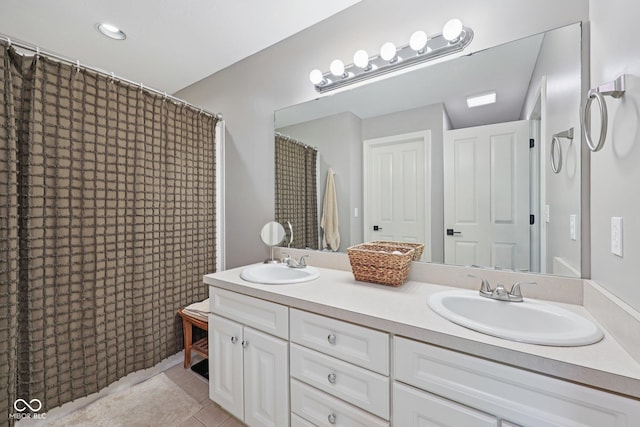 3571 S Cedar Creek Ln, New Palestine, IN 46163 - bathroom featuring double vanity, tile patterned flooring, and a shower with curtain