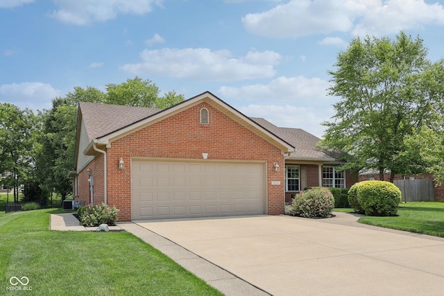 3571 S Cedar Creek Ln, New Palestine, IN 46163 - view of front of home with brick siding, an attached garage, driveway, and a shingled roof