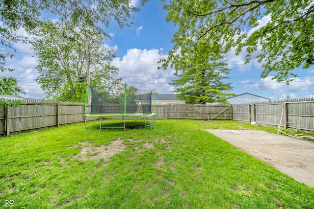 450 Columbia Ave, Tipton, IN 46072 - view of yard featuring a trampoline