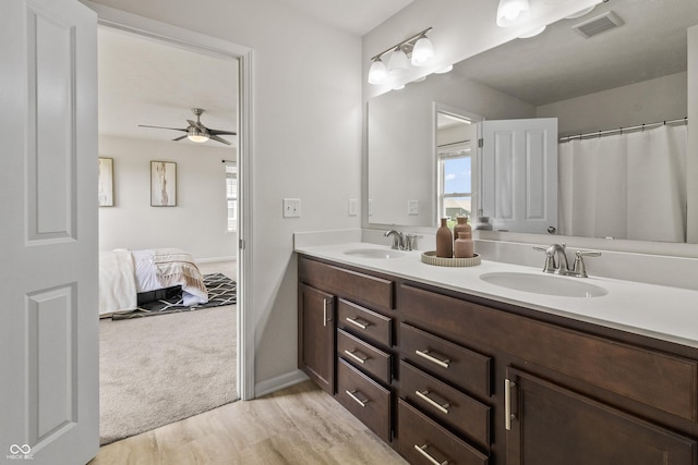 10112 Gallop Ln, Fishers, IN 46040 - full bathroom featuring double vanity, ceiling fan, and ensuite bathroom