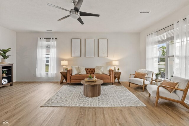 10112 Gallop Ln, Fishers, IN 46040 - living area with wood finished floors and ceiling fan