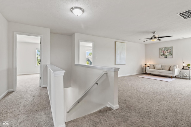 10112 Gallop Ln, Fishers, IN 46040 - hall with an upstairs landing, carpet flooring, and healthy amount of natural light