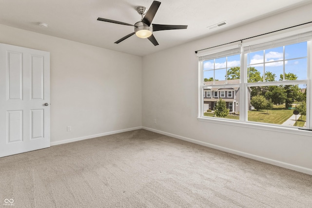 10112 Gallop Ln, Fishers, IN 46040 - spare room featuring carpet, a ceiling fan, and a smoke detector