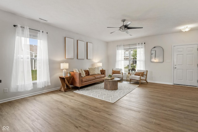 10112 Gallop Ln, Fishers, IN 46040 - living area featuring a ceiling fan and wood finished floors