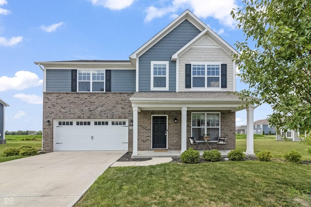10112 Gallop Ln, Fishers, IN 46040 - view of front facade with an attached garage, covered porch, a front lawn, and brick siding
