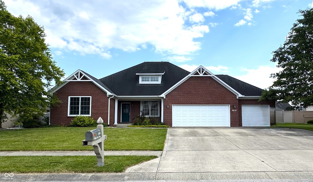 1019 White Oak Dr, Plainfield, IN 46168 - view of front of house with brick siding, a garage, and concrete driveway