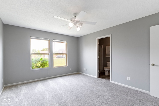 3423 Summer Breeze Cir, Indianapolis, IN 46239 - unfurnished bedroom with carpet flooring, ensuite bathroom, a textured ceiling, and ceiling fan
