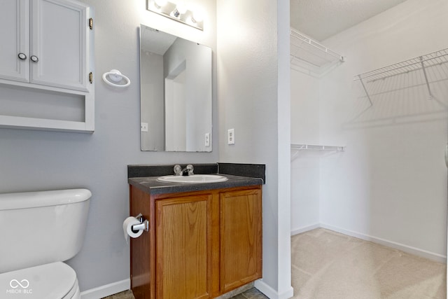 3423 Summer Breeze Cir, Indianapolis, IN 46239 - bathroom featuring vanity and a spacious closet