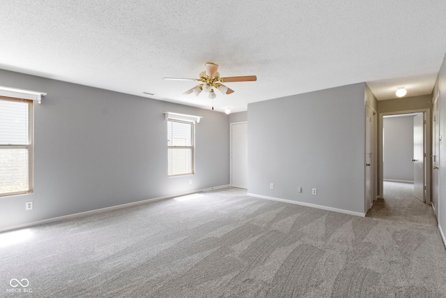 3423 Summer Breeze Cir, Indianapolis, IN 46239 - carpeted spare room featuring ceiling fan and a textured ceiling