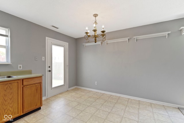 3423 Summer Breeze Cir, Indianapolis, IN 46239 - unfurnished dining area featuring a chandelier and light floors