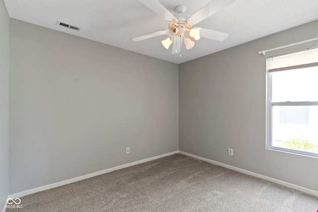 3423 Summer Breeze Cir, Indianapolis, IN 46239 - unfurnished room featuring carpet floors, plenty of natural light, and a ceiling fan