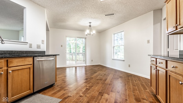 10216 Hatherley Way, Fishers, IN 46037 - kitchen featuring dishwasher, a chandelier, dark wood-style floors, a textured ceiling, and pendant lighting