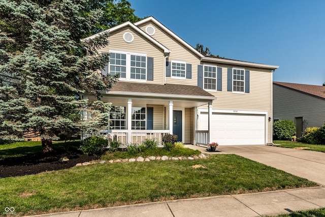 10216 Hatherley Way, Fishers, IN 46037 - traditional home with an attached garage, driveway, a porch, and a front yard