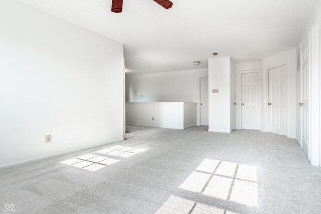 10216 Hatherley Way, Fishers, IN 46037 - unfurnished living room with carpet and baseboards