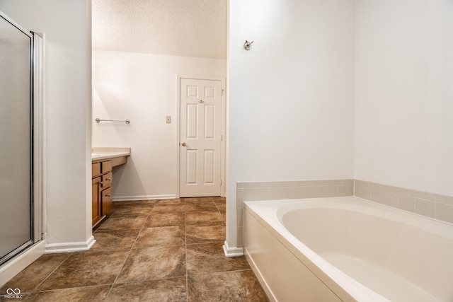 10216 Hatherley Way, Fishers, IN 46037 - bathroom with a garden tub, vanity, and a shower stall
