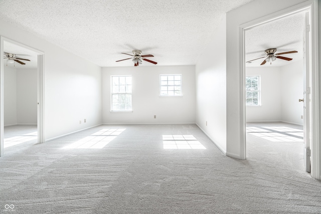 10216 Hatherley Way, Fishers, IN 46037 - spare room featuring a ceiling fan, a textured ceiling, and carpet