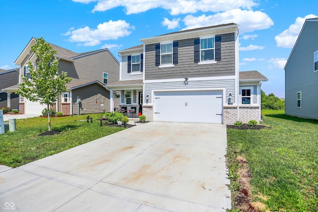 741 Scarsdale Ln, Danville, IN 46122 - view of front of property with an attached garage, a front yard, brick siding, and concrete driveway