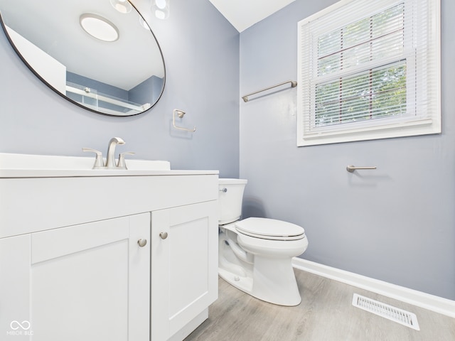 2126 Tartan Rd, Anderson, IN 46012 - half bath with wood finished floors and vanity