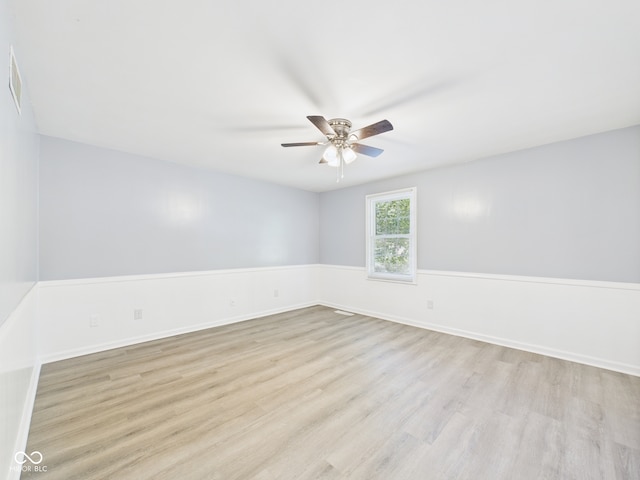 2126 Tartan Rd, Anderson, IN 46012 - empty room featuring ceiling fan and wood finished floors