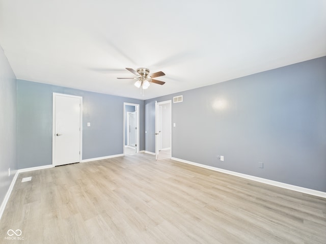 2126 Tartan Rd, Anderson, IN 46012 - unfurnished bedroom with light wood-style flooring and ceiling fan